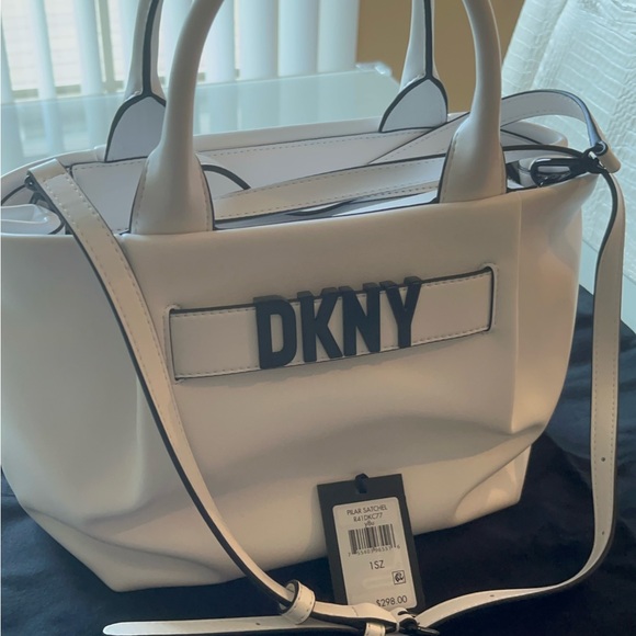 chic satchel by DKNY features multiple pockets - Picture 3 of 6